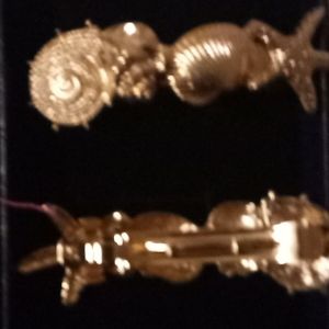 One set of earrings and one set of hair classes I